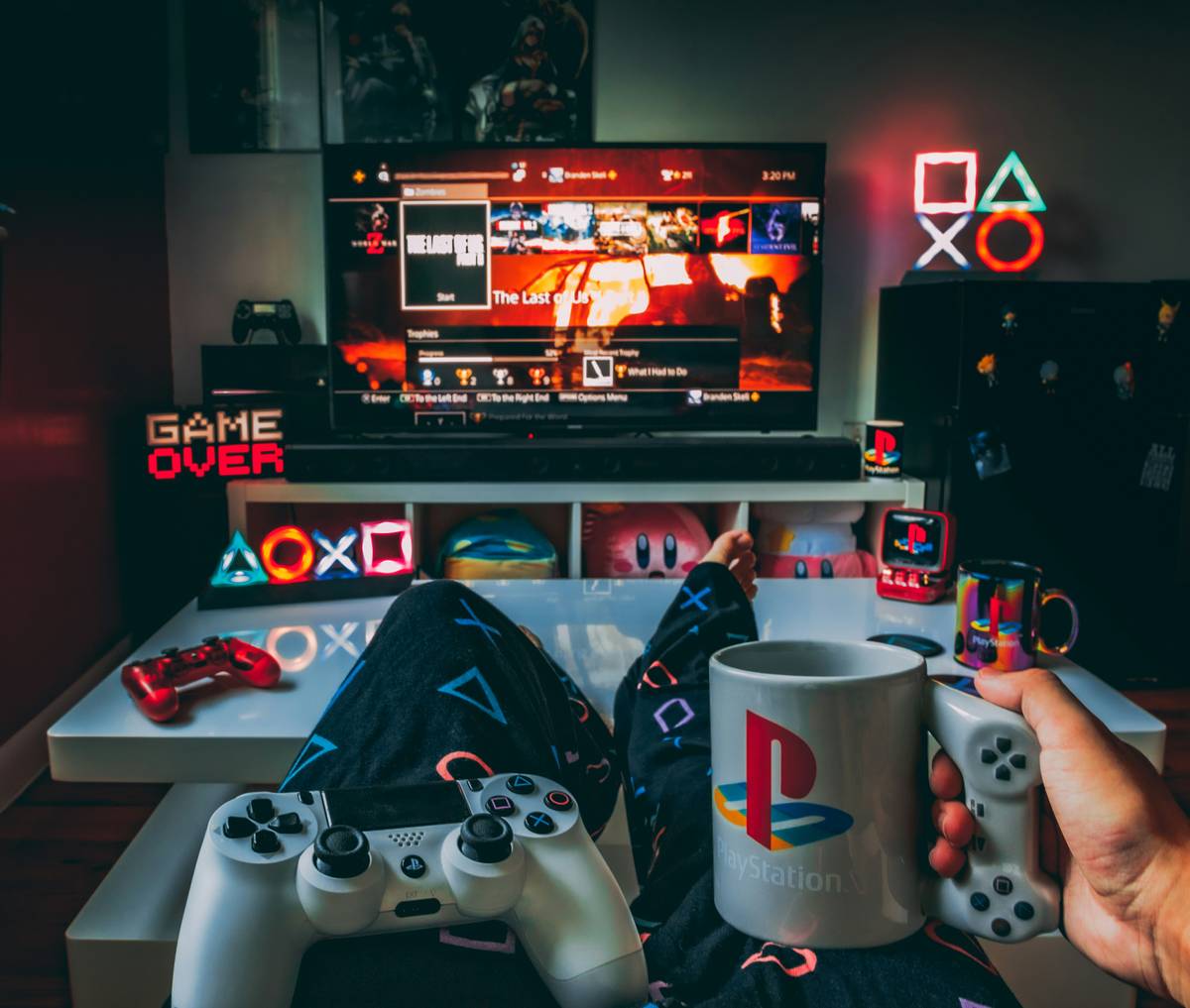 Pre-gaming energy snacks arranged neatly on a gaming desk beside a mechanical keyboard and headset